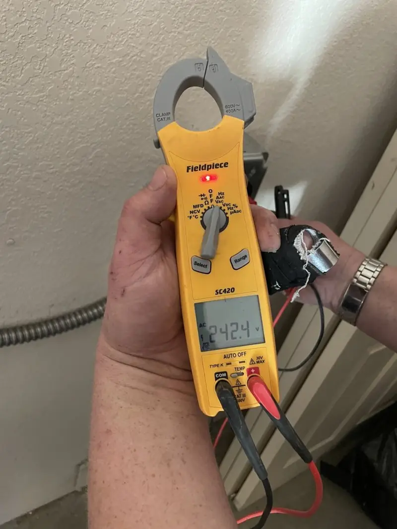 Voltage testing with clamp meter during Generator Installation in Nebraska City